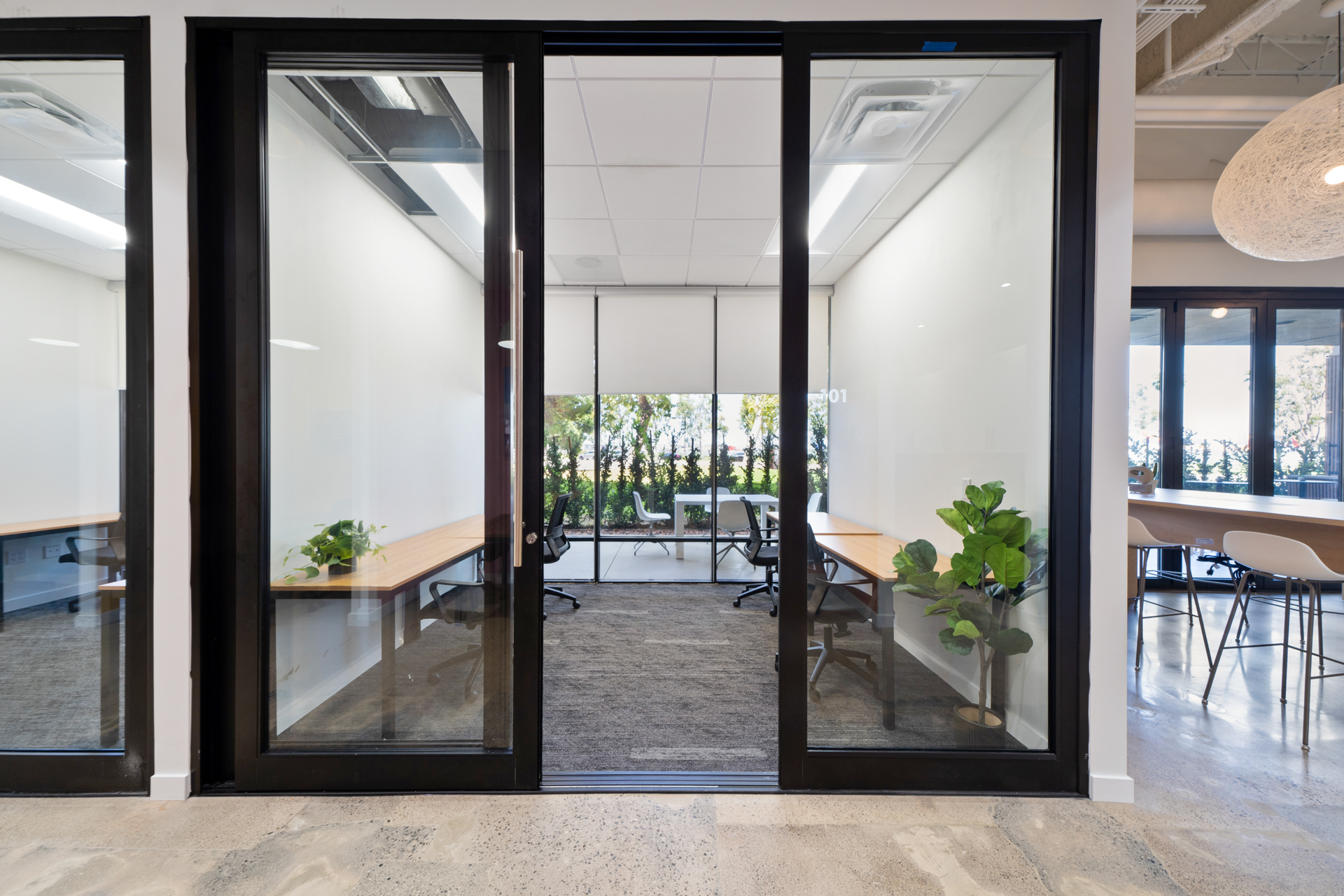 Private office space with glass windows that you can see into it through